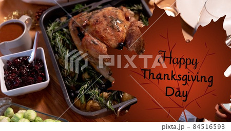 Composite image of turkey meat and delicious meal with happy thanksgiving text Composite image of turkey meat and delicious meal with happy thanksgiving text 84516593