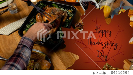 Composite image of woman having turkey meat at dinner party with happy thanksgiving text 84516594