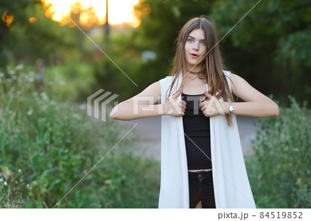 young girl on nature shows emotions 84519852