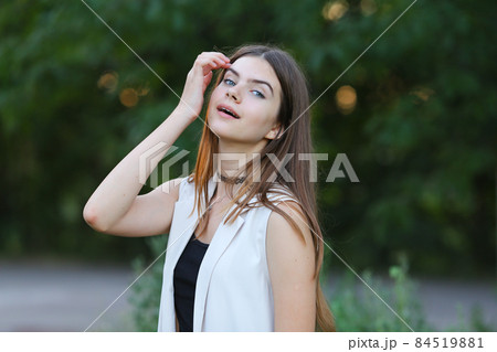 young girl on nature shows emotions 84519881