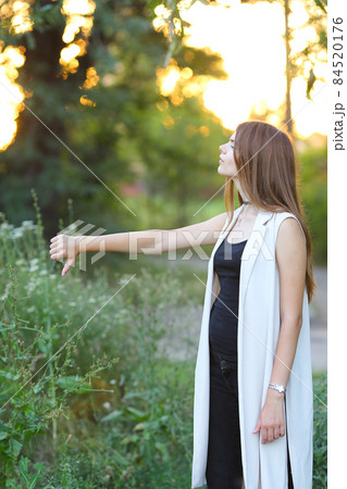 young girl on nature shows emotions young girl on nature shows emotions 84520176