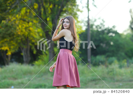 Young beautiful girl shows emotions delight pleasure bliss Young beautiful girl shows emotions delight pleasure bliss 84520840