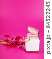 cream jar on pink background with space for text, beauty and health theme, valentine's day gift 84522245
