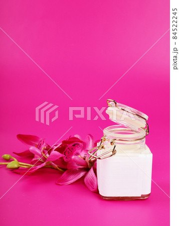 cream jar on pink background with space for text, beauty and health theme, valentine's day gift 84522245