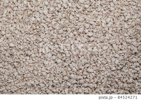 Cat litterbox with natural flushable biodegradable refined active pine wood pellet as clumping litter. Eco-friendly product for indoor pets. Closeup Cat litterbox with natural flushable biodegradable refined active pine wood pellet as clumping litter. Eco-friendly product for indoor pets. Closeup 84524271