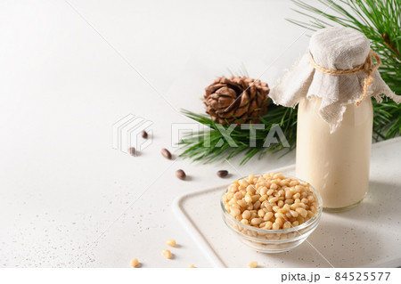 Vegan cedar milk on white background. Non dairy alternative milk. 84525577