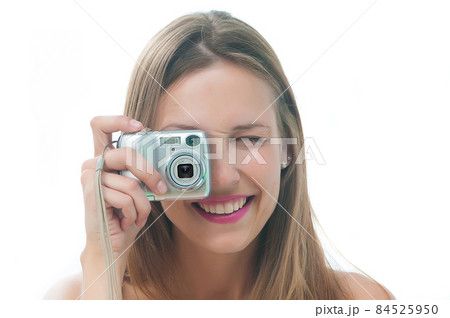 Beautiful woman in bikini taking picture on her phone isolated on white background Beautiful woman in bikini taking picture on her phone isolated on white background 84525950