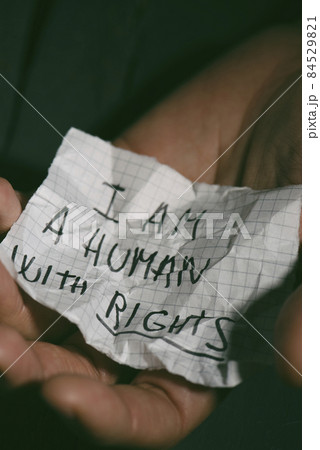 piece of paper that reads I am a human with rights piece of paper that reads I am a human with rights 84529821