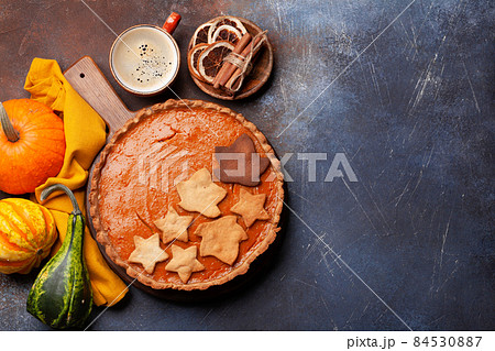 Pumpkin pie and various pumpkins 84530887