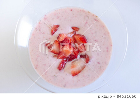 Fresh tasty delicious strawberry yoghurt with topping Fresh tasty delicious strawberry yoghurt with topping 84531660