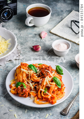 Pasta with mini meatballs 84535784