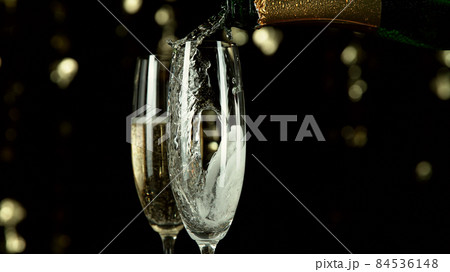 Champagne theme with bottle and glasses. 84536148