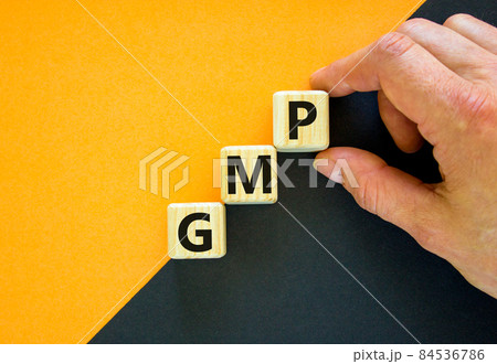 GMP, good manufacturing practice symbol. Concept words GMP, good manufacturing practice on cubes on a beautiful orange background. Business and GMP, good manufacturing practice concept. Copy space. GMP, good manufacturing practice symbol. Concept words GMP, good manufacturing practice on cubes on a beautiful orange background. Business and GMP, good manufacturing practice concept. Copy space. 84536786