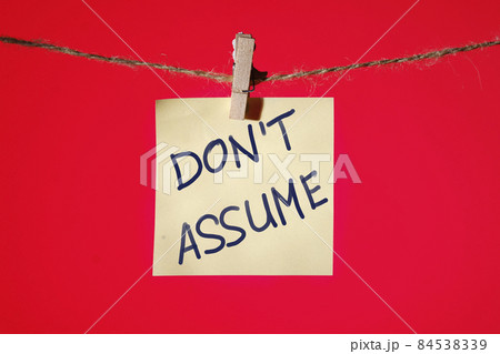 ext on yellow paper on a red background Don't Assume. Denoting what not to take into account if there is no evidence ext on yellow paper on a red background Don't Assume. Denoting what not to take into account if there is no evidence 84538339