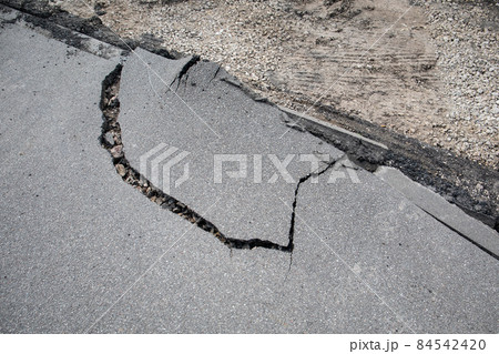 Asphalt concrete damage. Road repair and reconstruction Asphalt concrete damage. Road repair and reconstruction 84542420