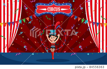 Stage scene with aerial female gymnast on ring Stage scene with aerial female gymnast on ring 84556363