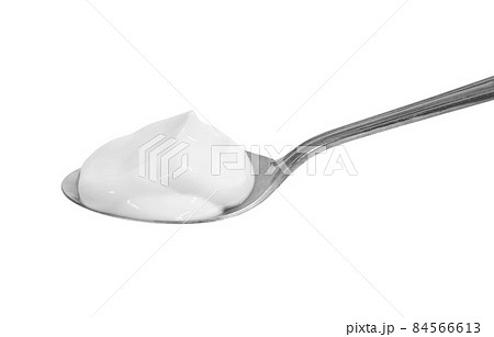 スプーンに白いクリーム 84566613