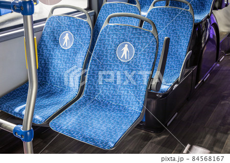 seats on a city bus or electric bus for the elderly and people 84568167