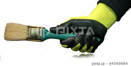 Hand with Work Gloves Holding a Paintbrush Isolated on White Background Hand with Work Gloves Holding a Paintbrush Isolated on White Background 84569064