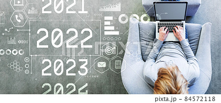 2022 New Year concept with man using a laptop 84572118