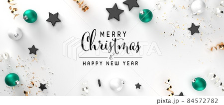 Merry Christmas message with baubles and stars 84572782