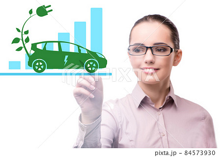 Electric car concept with businesswoman pressing button Electric car concept with businesswoman pressing button 84573930