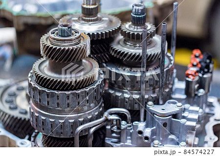 Close-up helical gears in car automatic transmission Close-up helical gears in car automatic transmission 84574227