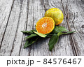 Fresh orange fruit on wood background 84576467