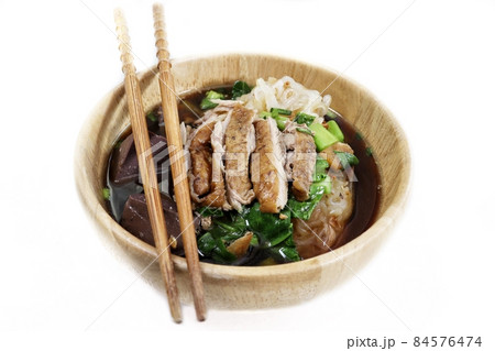 Duck noodle in soup of Asia food isolated white background 84576474