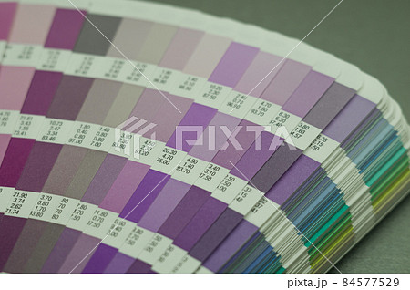 Fan of color shades. A sample of the chromaticity of the colors system. Reference colors of paints. Selective focus 84577529