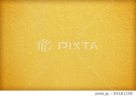 golden or yellow paint on cement wall texture background. golden or yellow paint on cement wall texture background. 84581206