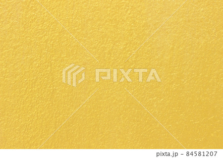 golden or yellow paint on cement wall texture background. golden or yellow paint on cement wall texture background. 84581207