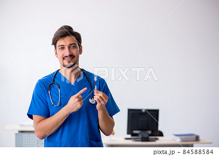 Young male doctor working in the clinic 84588584