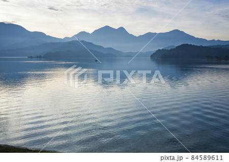 sunrise scenery of Sun Moon Lake in Nantou, Taiwan, is one of the famous attractions in Taiwan. sunrise scenery of Sun Moon Lake in Nantou, Taiwan, is one of the famous attractions in Taiwan. 84589611