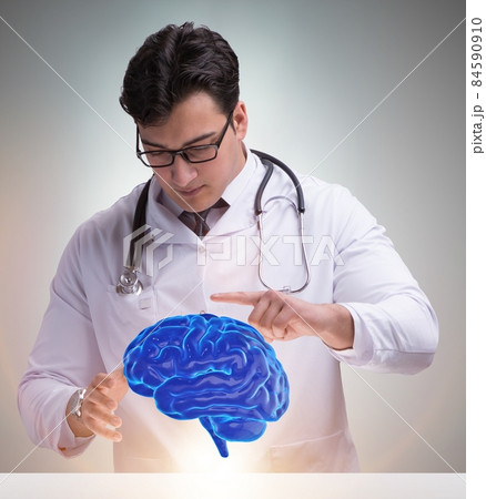 Male doctor with the brain in medical concept 84590910