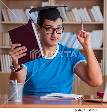 Young man graduating from university 84590950