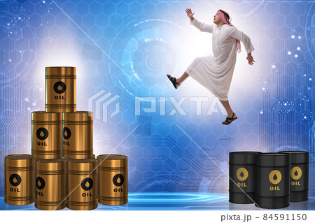 Arab businessman jumping from oil barrels Arab businessman jumping from oil barrels 84591150