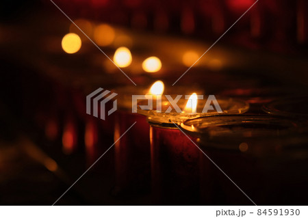 lit candles in the church 84591930