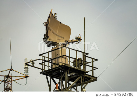 Coast guard radar station against the blue sky. Coast guard radar station against the blue sky. 84592786