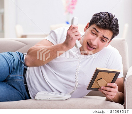 Young man in sad saint valentine concept 84593517
