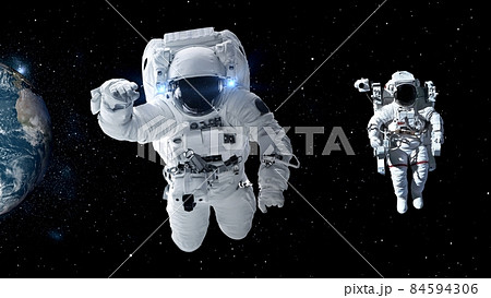 Astronaut spaceman do spacewalk while working for spaceflight mission 84594306