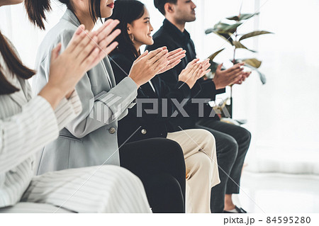 Businesswoman proficiently present work project receive celebrations from team 84595280