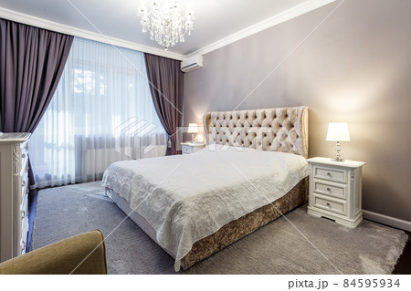 luxury hotel bedroom. Bed with carriage coupler headboard luxury hotel bedroom. Bed with carriage coupler headboard 84595934