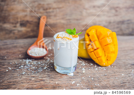Homemade yogurt with fresh mango slices 84596569