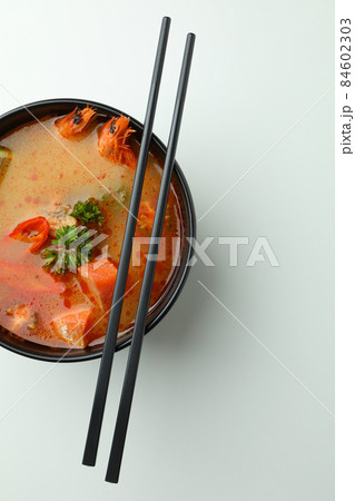 Tasty Tom yum soup on white background 84602303