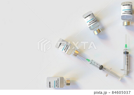 Clock face made with coronavirus vaccine vials and syringes. Vaccination time concept. Conceptual medical 3D rendering Clock face made with coronavirus vaccine vials and syringes. Vaccination time concept. Conceptual medical 3D rendering 84605037