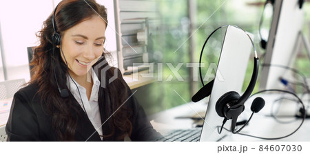 Business people wearing headset working in office broaden view 84607030