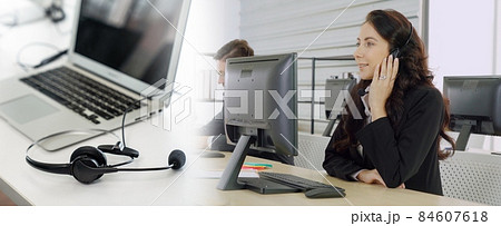 Business people wearing headset working in office broaden view Business people wearing headset working in office broaden view 84607618
