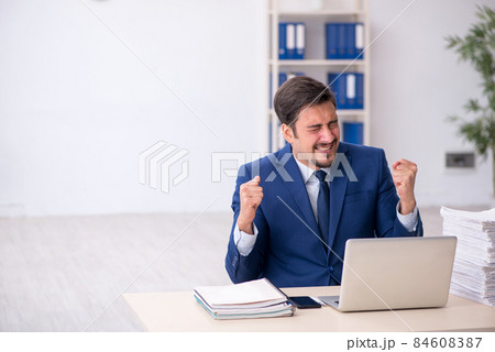 Young businessman in the open office Young businessman in the open office 84608387
