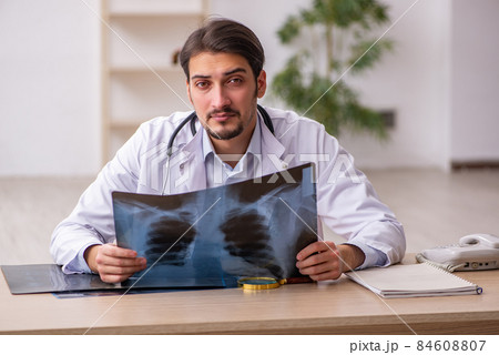 Young male doctor radiologist working in the clinic 84608807